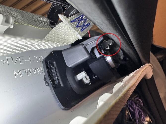 the plastic/metal clip close to tweeter